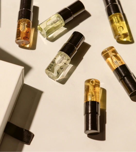 Six ESAS fragrance vials scattered beside the kit box