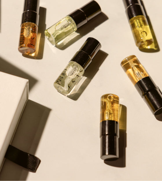 Six ESAS fragrance vials scattered beside the kit box